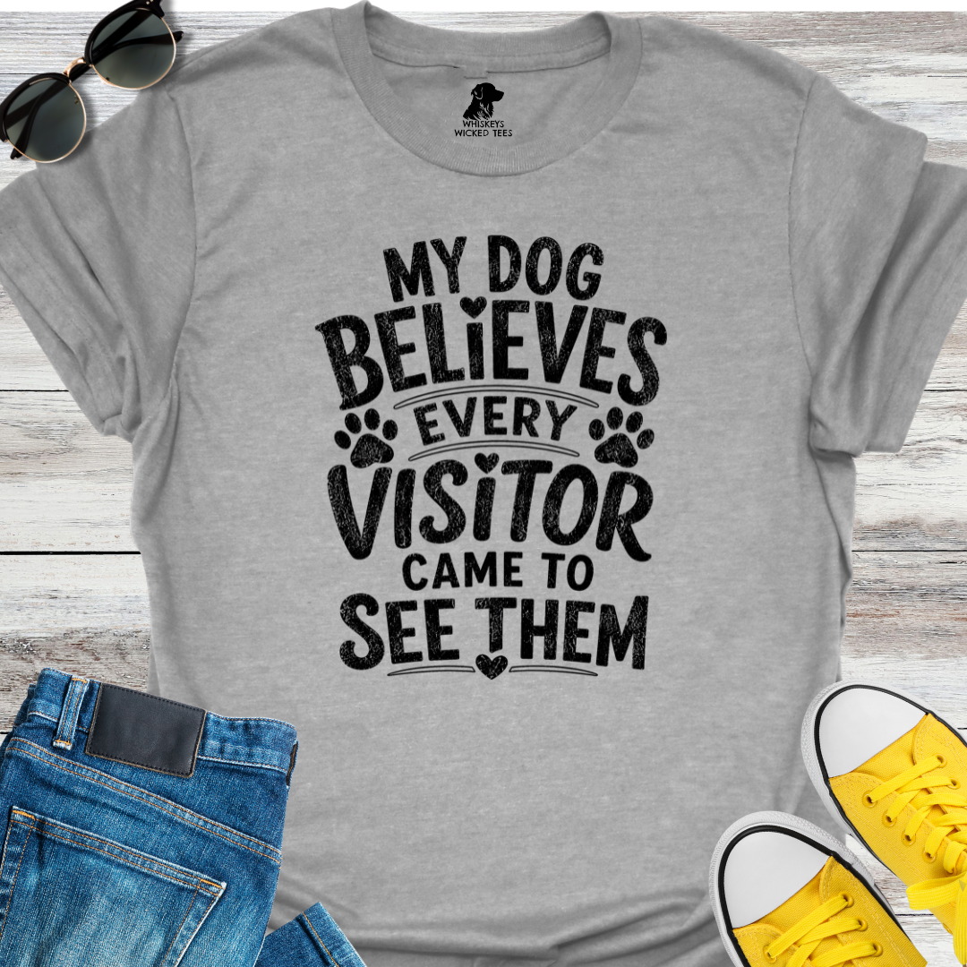My Dog Believes Every Visitor....  T-shirt