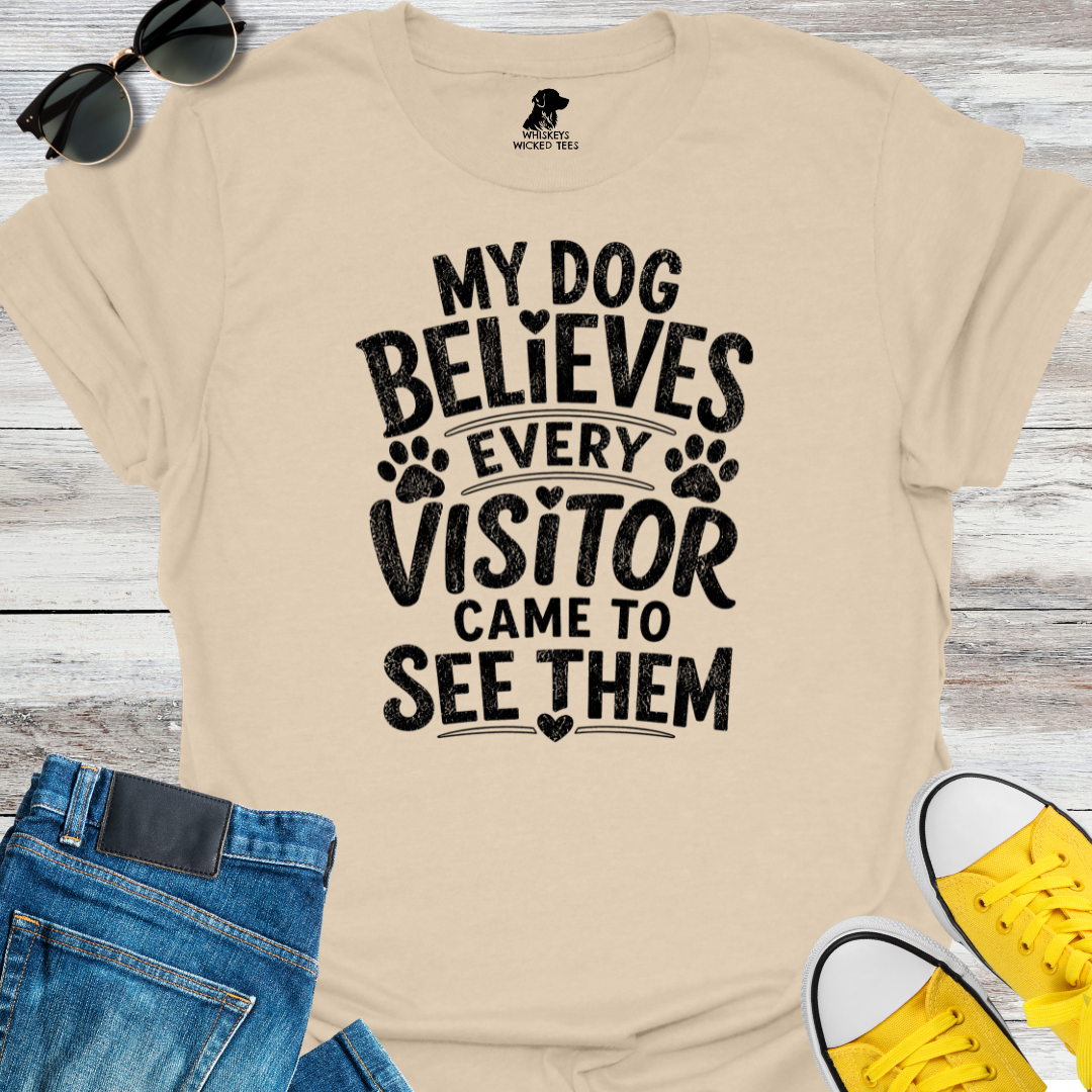 My Dog Believes Every Visitor....  T-shirt